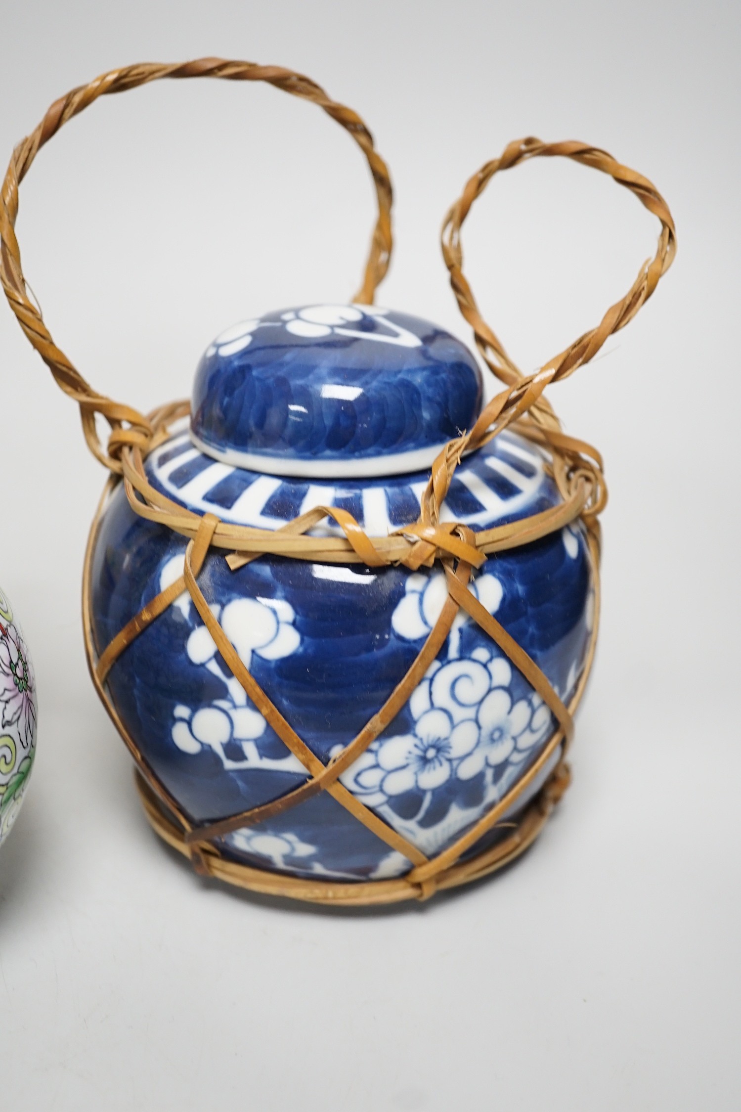 A group of Canton enamel vases, a pair of cloisonné enamel jars and a blue and white jar. Tallest 15.5cm